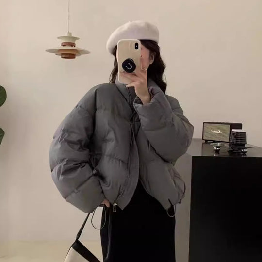 Damen Oversized Pufferjacke mit elastischem Bund und seitlichen Reißverschlusstaschen EB