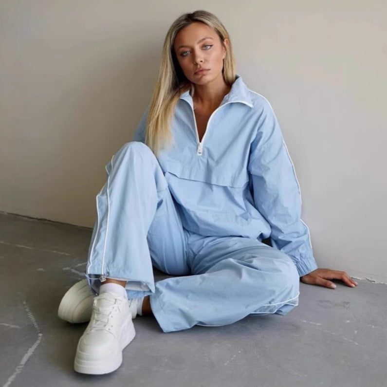 Damen leichtes Half-Zip Windbreaker-Oberteil mit Kängurutasche, elastischen Bündchen und seitlicher Paspel Eichborn Berlin