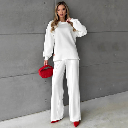 Damen eleganter Lounge-Zweiteiler mit Oversize-Sweatshirt und taillierter Weitbein-Hose Eichborn Berlin