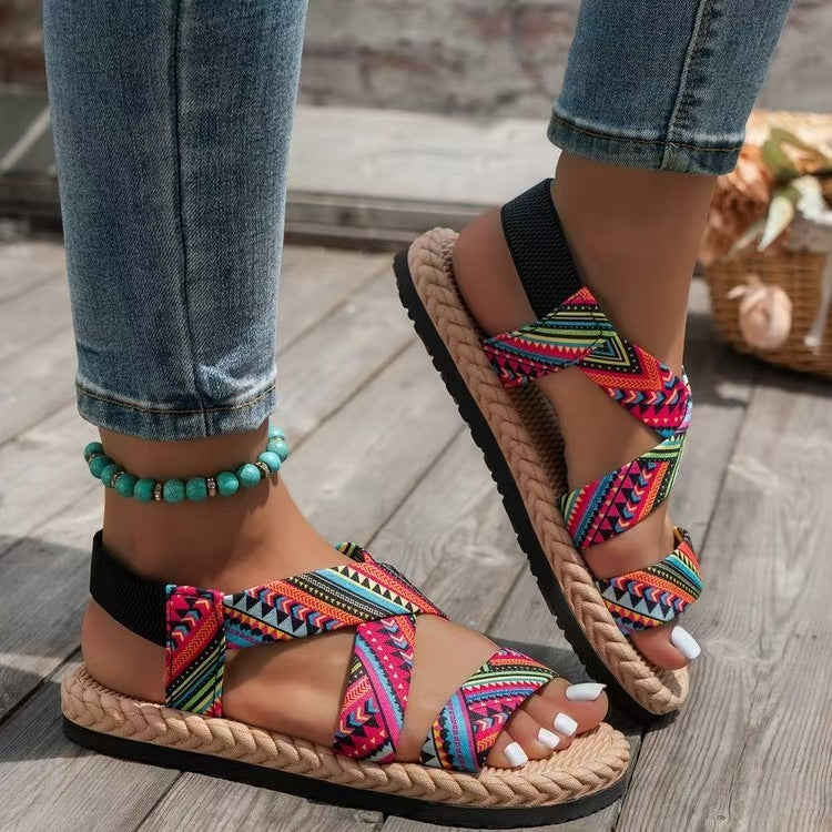 Damen nan flache Espadrille-Riemchensandalen mit geflochtenem Bastrand, elastischem Fersenband und gekreuzten Ethno-Riemen EB