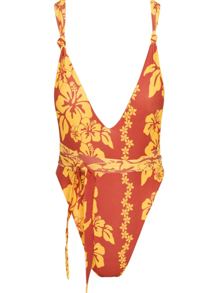 Damen Einteiliger Badeanzug mit tiefem V-Ausschnitt und floralem Design EB