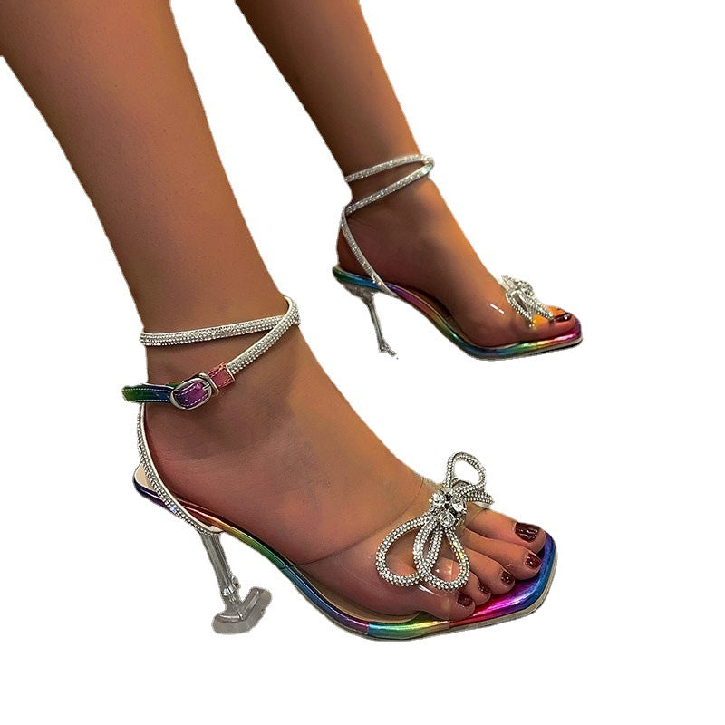 Damen Elegante High Heel Sandalen mit funkelndem Schleifen-Design und transparentem Absatz EB