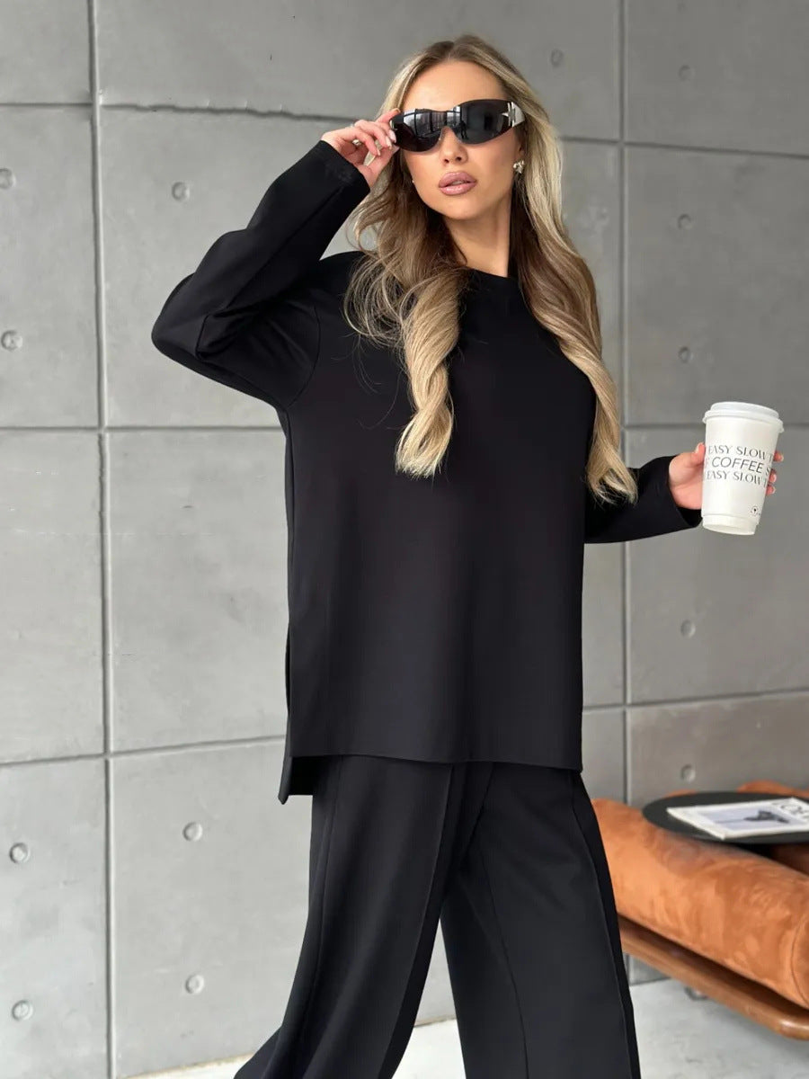 Damen eleganter Lounge-Zweiteiler mit Oversize-Sweatshirt und taillierter Weitbein-Hose Eichborn Berlin