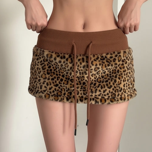 Damen eleganter Minirock aus fellartigem Material mit Modellknopf und Taillenband EB