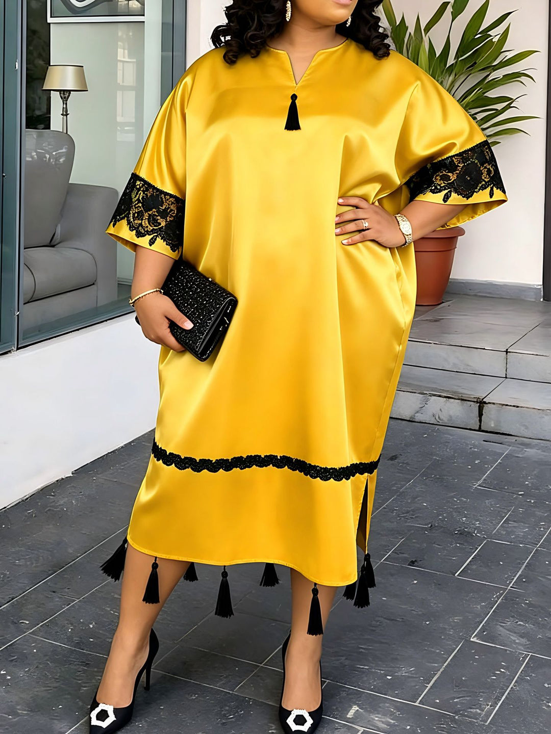 Damen elegantes Kaftankleid mit raffinierten Spitzenärmel und dekorativen Quasten EB