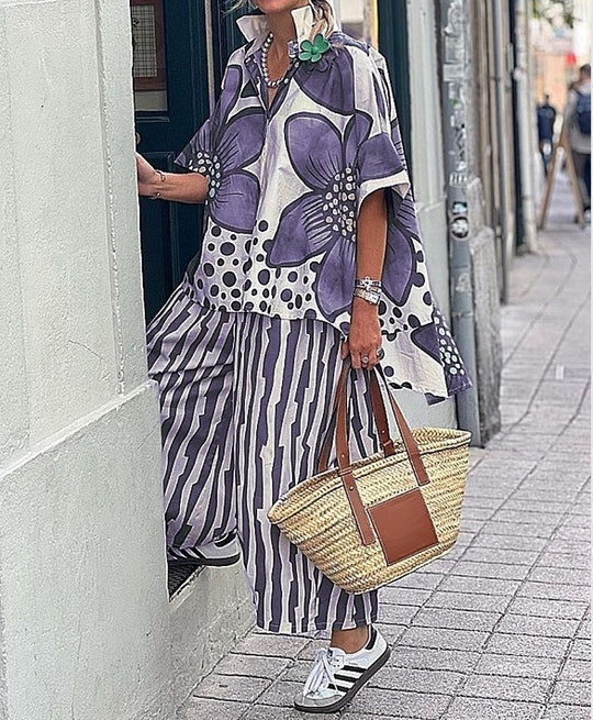Damen Übergroßes Tunika-Set mit floralem Muster und gestreiften Hosen EB