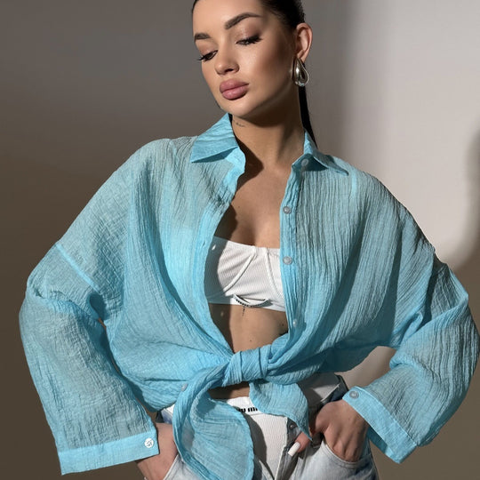 Damen lässige Hemdbluse mit oversized Schnitt und Knopfdetails EB