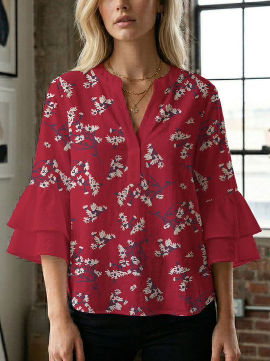 Damen Blusenshirt mit voluminösen Ärmeln und kreativem Druckdesign EB