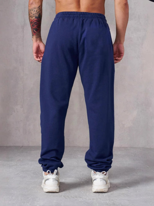Herren Baggy Jogginghose mit elastischem Bund und seitlichen Taschen EB