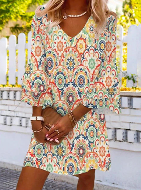 Damen Kurzarm Kleid mit buntem geometrischen Druck und elegantem V-Ausschnitt Heidi-Mode
