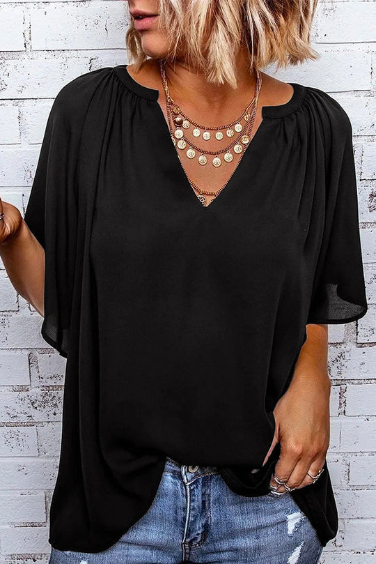 Damen Fließendes Blusenshirt mit ballonförmigen Ärmeln und elastischem Saum EB