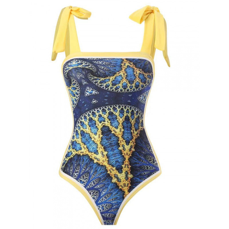 Damen Einteiliger Badeanzug mit stilvollem Wickelrock und modischem Muster EB