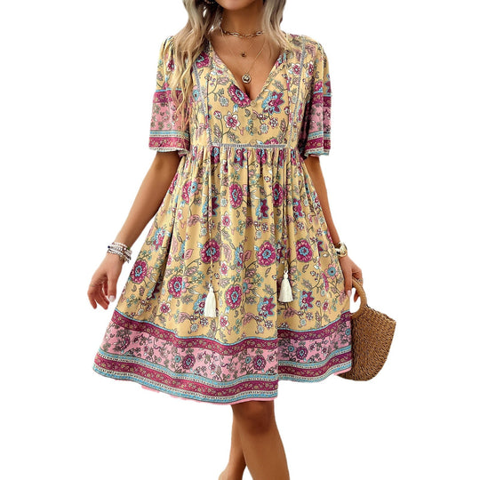 Damen Retro-Chic Kleid mit Blumenmuster und fließendem Rock EB