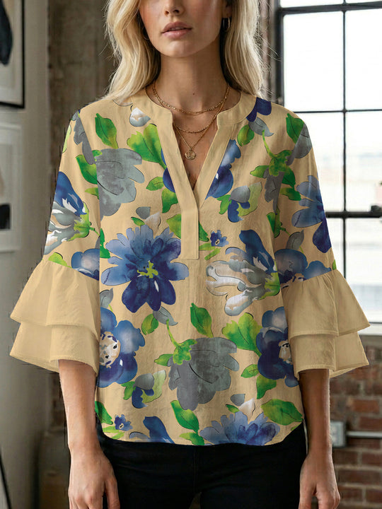 Damen Bluse mit voluminösen Ärmeln und floralem Design EB