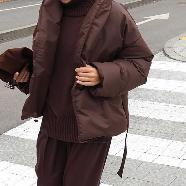 Damen Oversized Steppjacke mit Gürtel und hohem Kragen EB