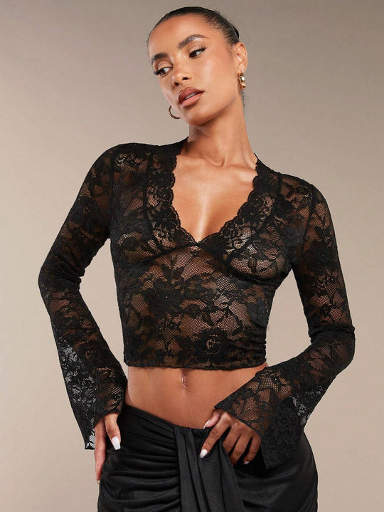 Damen Spitzenbluse mit romantischen Details EB