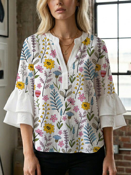 Damen Bluse mit voluminösen Rüschenärmeln und floralem Muster EB