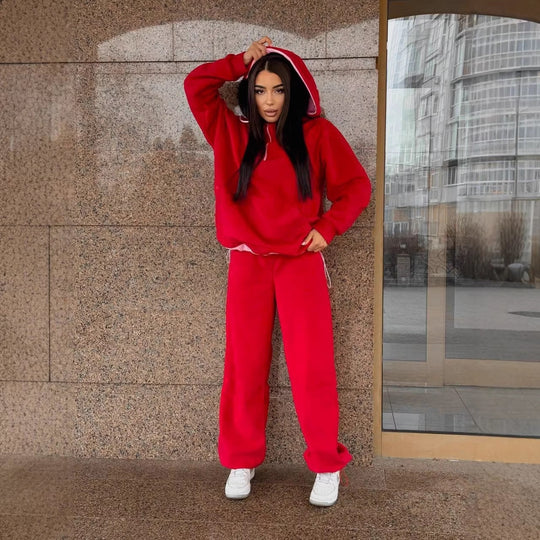 Damen Fleece-Loungewear-Set mit halbem Frontzip, gefütterter Kapuze und hochgeschnittener Komforthose Eichborn Berlin
