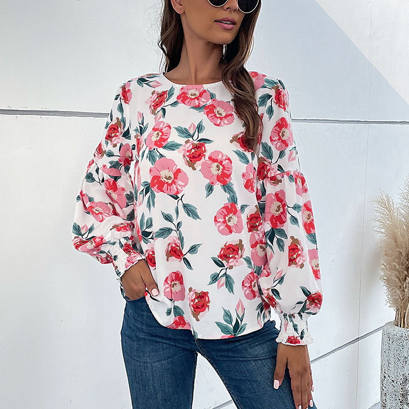Damen Bluse mit floralen Mustern und voluminösen Ärmeln EB