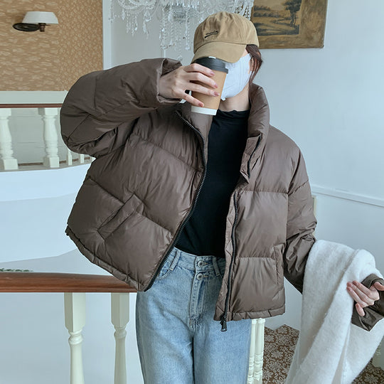 Damen Kurz geschnittene Pufferjacke mit hohem Kragen und seitlichen Taschen EB