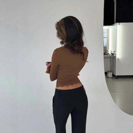 Damen Elegantes Langarmoberteil mit Spitzenkante und figurbetontem Schnitt EB