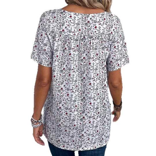 Damen nan lässiges Kurzarm-Tunika-Shirt mit Rundhalsausschnitt, zartem Blumenallover und dekorativen Brustfalten EB