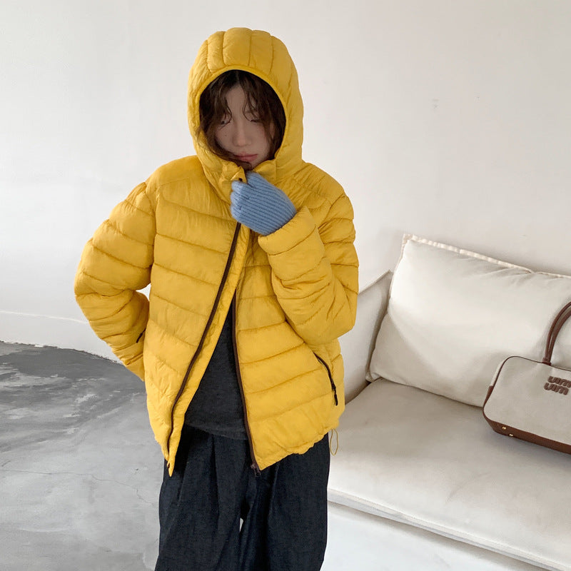 Damen ultraleichte Pufferjacke mit abnehmbarer Kapuze und elastischem Saum EB