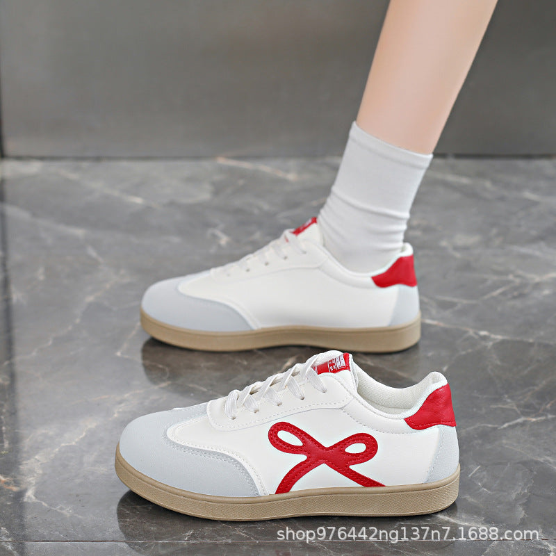 Damen Sneakers im sportlichen und eleganten Design mit rosa Akzenten EB