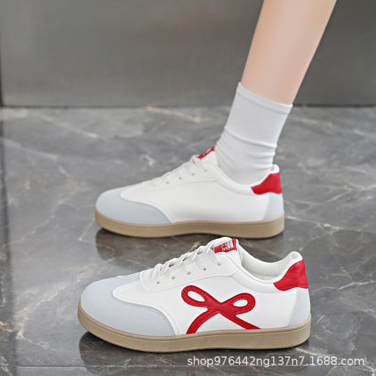 Damen Sneakers im sportlichen und eleganten Design mit rosa Akzenten EB