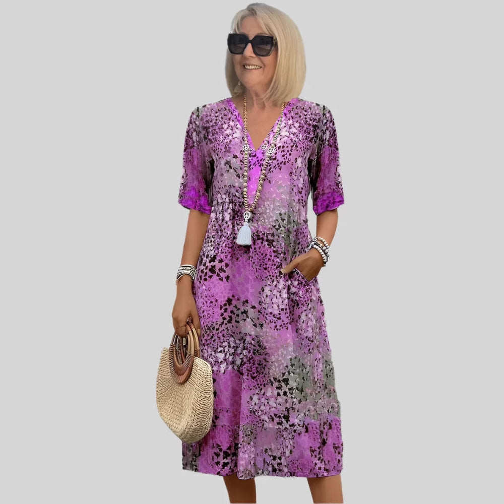Damen Sommerliches Maxikleid mit floralem Design und praktischen Taschen EB