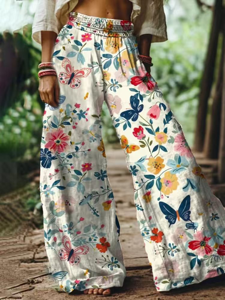 Damen Weite Sommerhose mit buntem Blumen- und Schmetterlingsprint EB