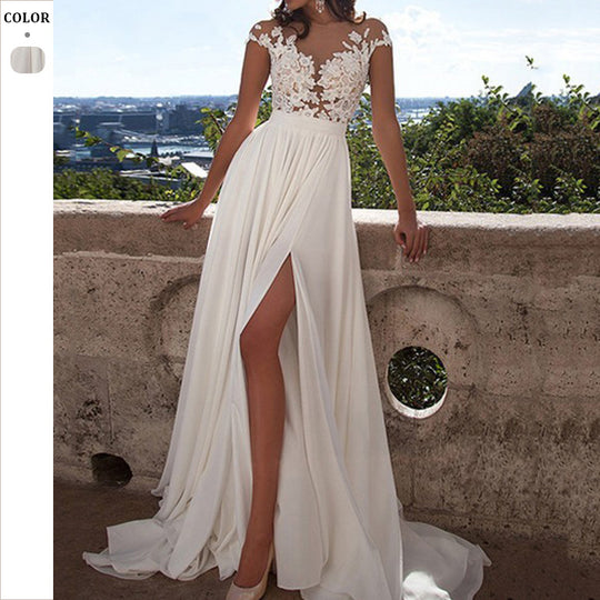 Damen Hochzeitskleid mit elegantem Spitzen-Oberteil und fließendem Rock EB