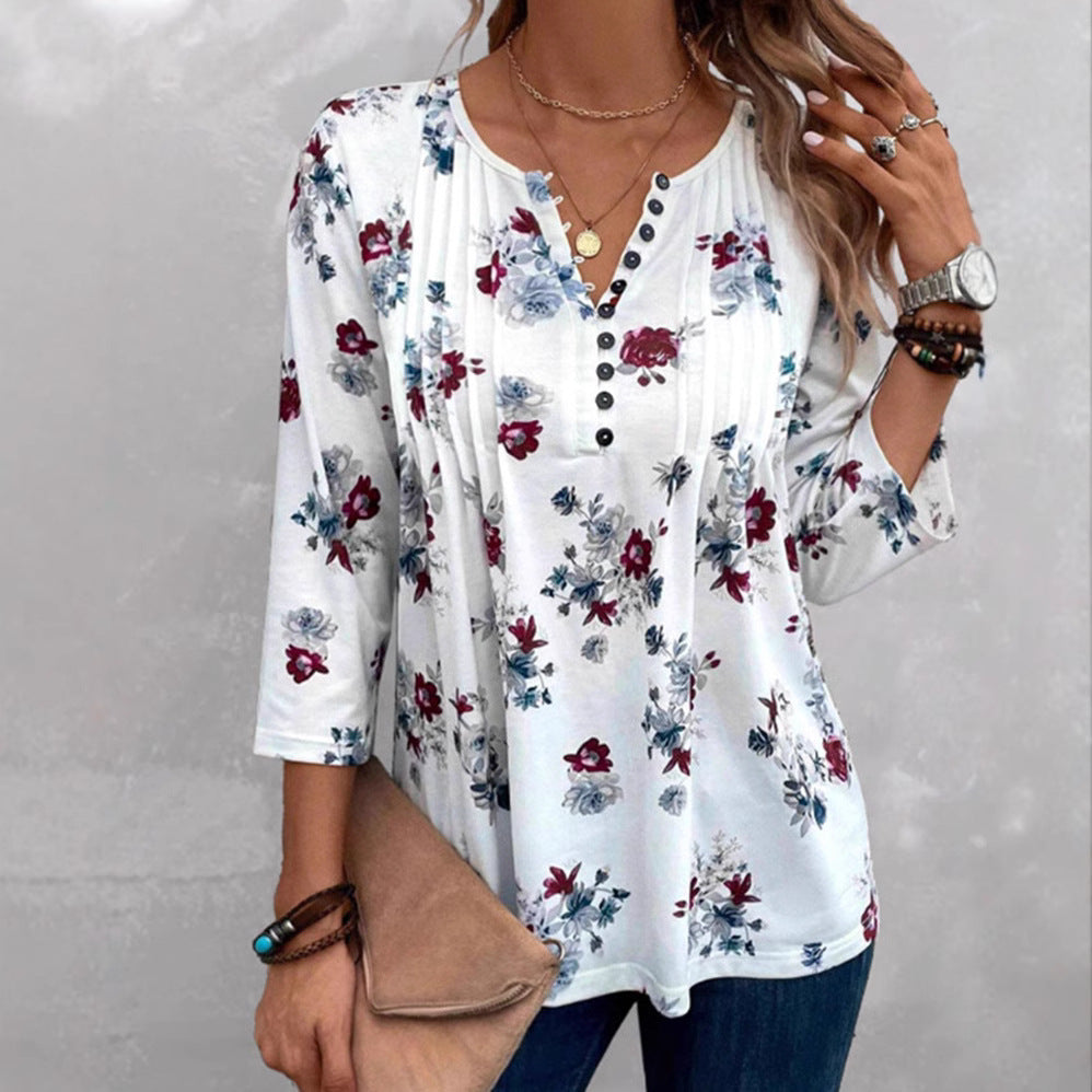 Damen Blusenshirt mit floralen Akzenten und knöpfbarem Ausschnitt Heidi-Mode