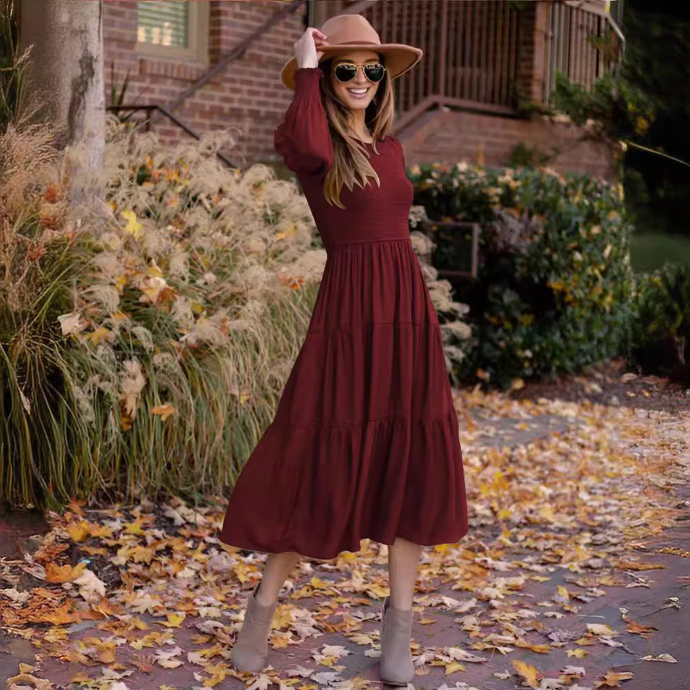 Damen Maxikleid mit schickem Smock-Oberteil und voluminösen Puffärmeln EB