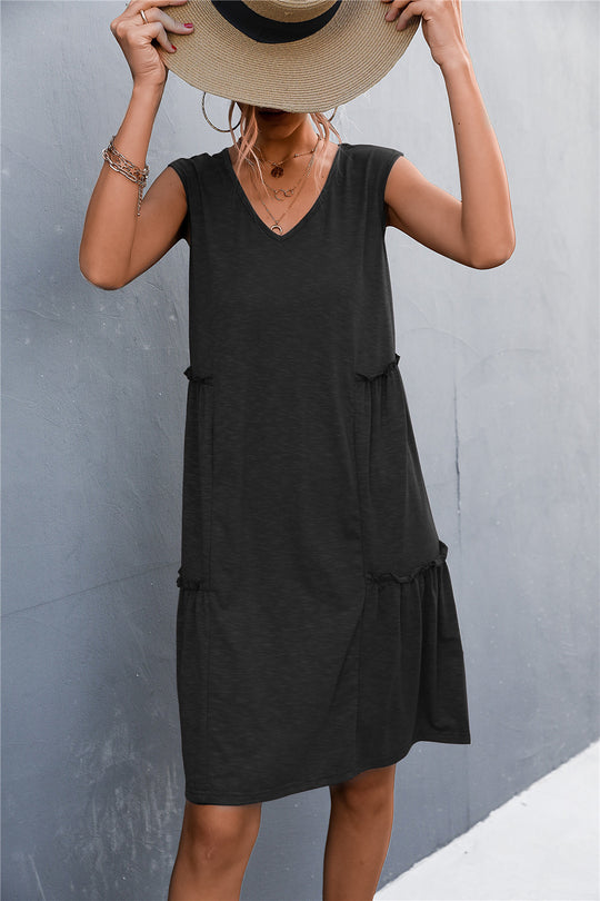 Damen Freizeitdress mit lockerem V-Ausschnitt und Rüschenkanten EB