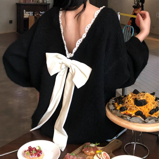 Damen Oversized Strickpullover mit V-Ausschnitt und zartem Spitzenrand EB