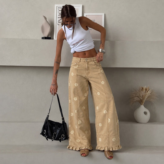 Damen weite Denimhose mit Gänseblümchen-Print, hohem Bund und Rüschenabschluss Eichborn Berlin