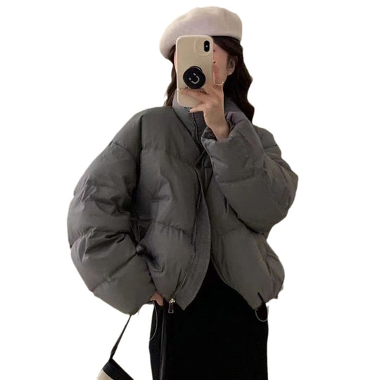 Damen Oversized Pufferjacke mit elastischem Bund und seitlichen Reißverschlusstaschen EB