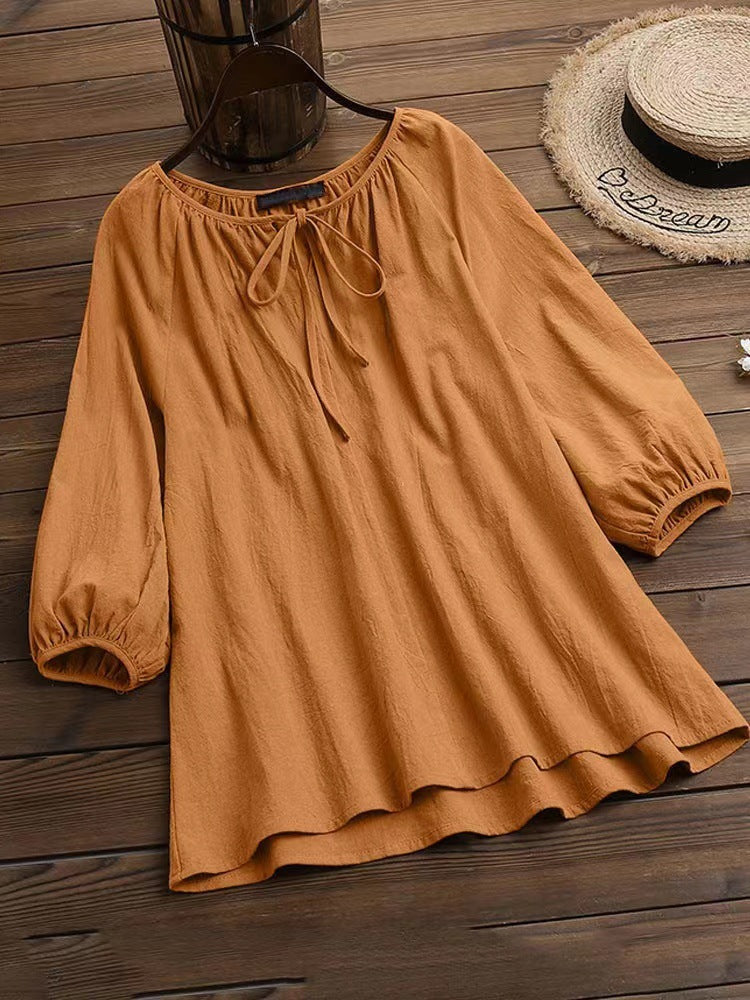 Damen Bluse mit elegantem Rundhalsausschnitt und knieumspielenden Puffärmeln EB