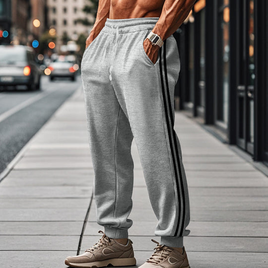 Herren Sportliche Jogginghose mit elastischem Bund und seitlichen Eingrifftaschen EB