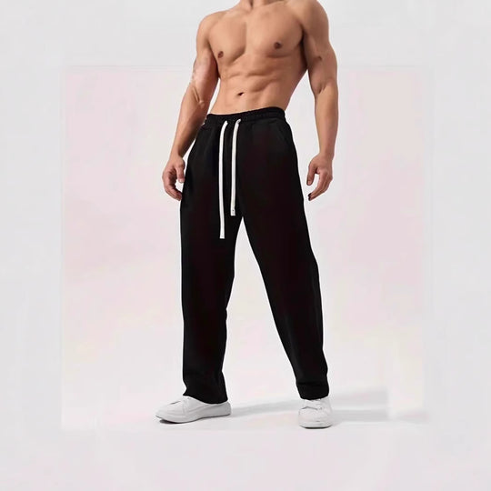 Herren nan locker sitzende Jogginghose aus Baumwollmischung mit elastischem Bund und Seitentaschen EB