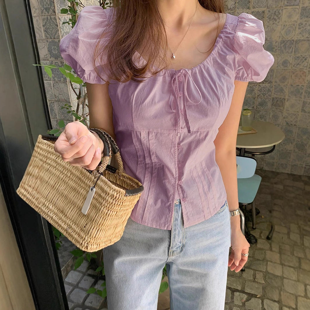 Damenbluse mit Puffärmeln und tailliertem Schnitt EB