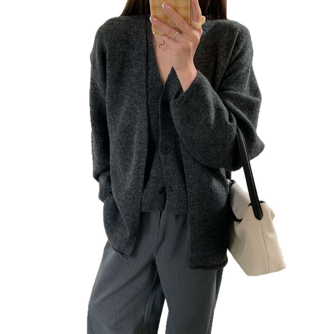 Damen Kuscheliger Strickcardigan mit großer Knopfleiste und Ballonärmeln EB