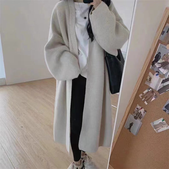 Damen Langer Wollmantel im minimalistischen Stil mit weitem Schnitt und eleganten Details EB