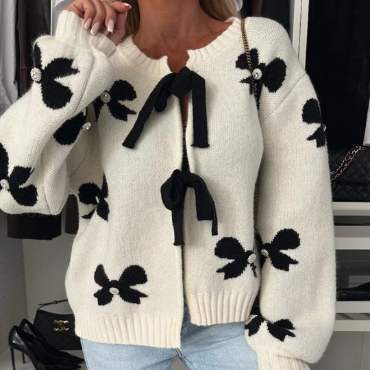 Damen Strickjacke mit dekorativen Schleifen und glänzenden Akzenten EB