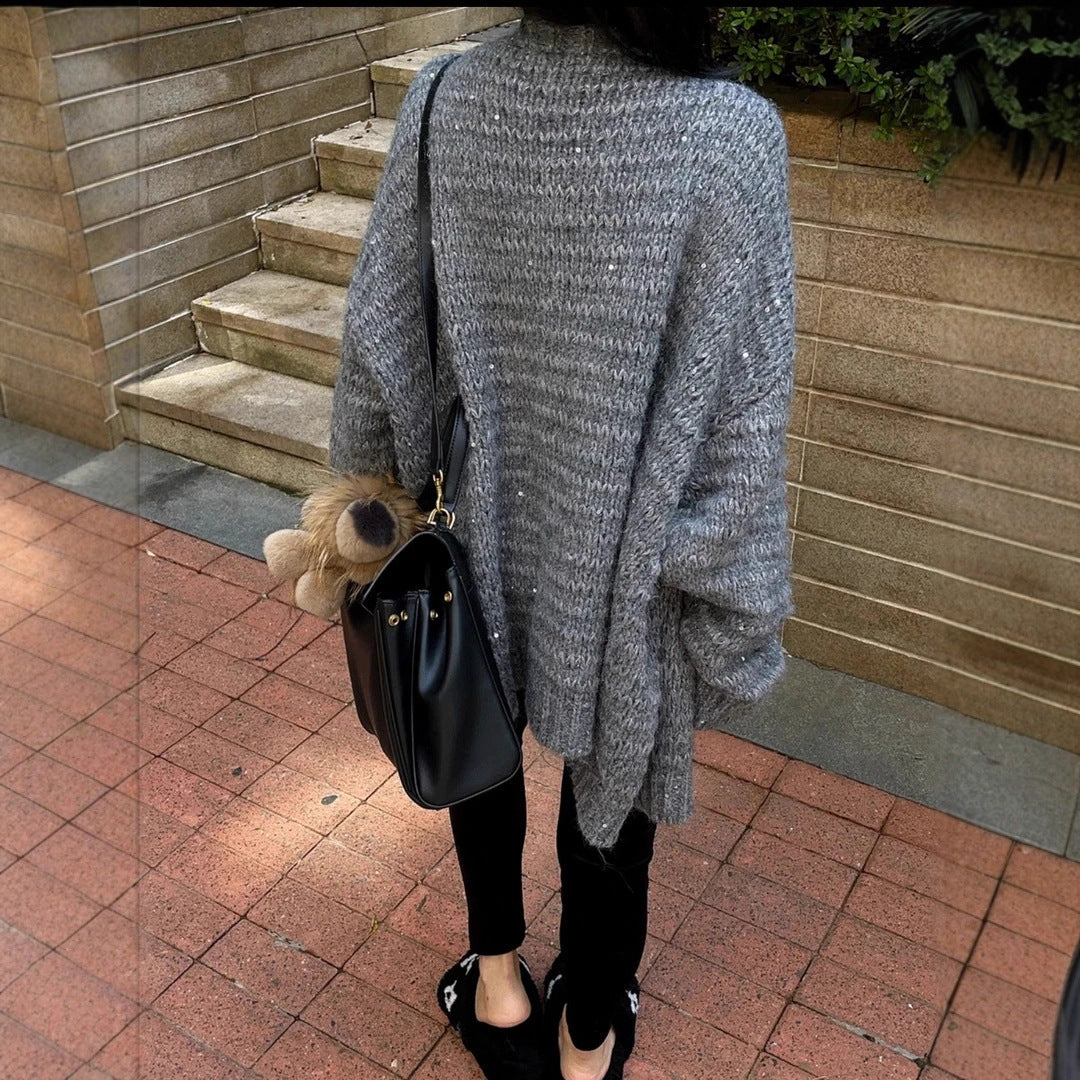 Damen Strickjacke mit voluminösen Ärmeln und einzigartiger Maschenstruktur EB