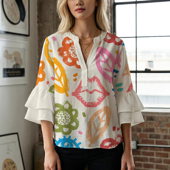 Damen Bluse mit voluminösen Rüschenärmeln und floralem Muster EB