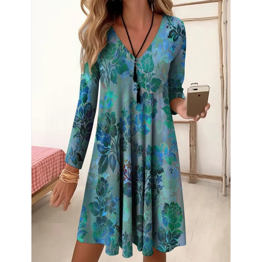 Damen V-Ausschnitt Freizeitkleid mit floraler Gestaltung und seitlichen Taschen EB