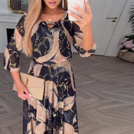 Damen Maxikleid mit elegantem Druckdesign und fließendem Schnitt Heidi-Mode