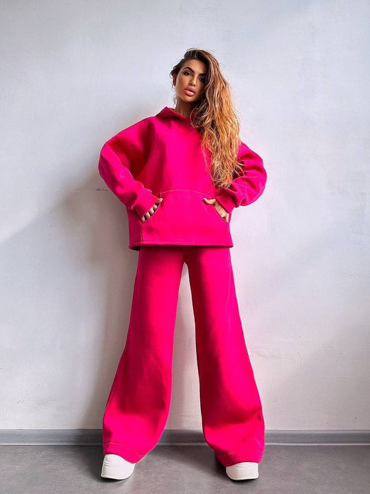 Damen Scuba-Fleece Lounge-Set mit Oversize-Kapuzenpullover und weiter Flare-Hose Eichborn Berlin